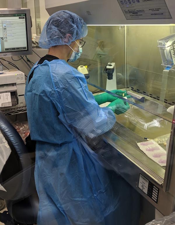 A pharmacist preparing antibiotics in Moses pharmacy