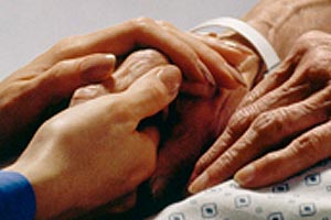 Geriatrics doctor holds patient's hands, Divisions of Geriatrics, Department of Medicine, Albert Einstein College of Medicine, Bronx, NY