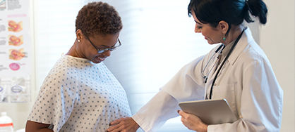 Doctor speaking to patient