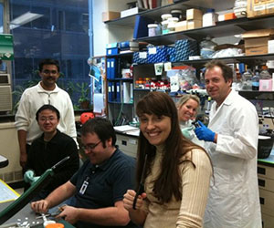 At front, center: Clarissa, during her time as a Ph.D. student, with lab mates in the laboratory of John Blanchard, Ph.D.