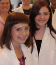Actress Abigail Breslin and cancer survivor Pearce Quesenberry visit a cancer research lab at Einstein