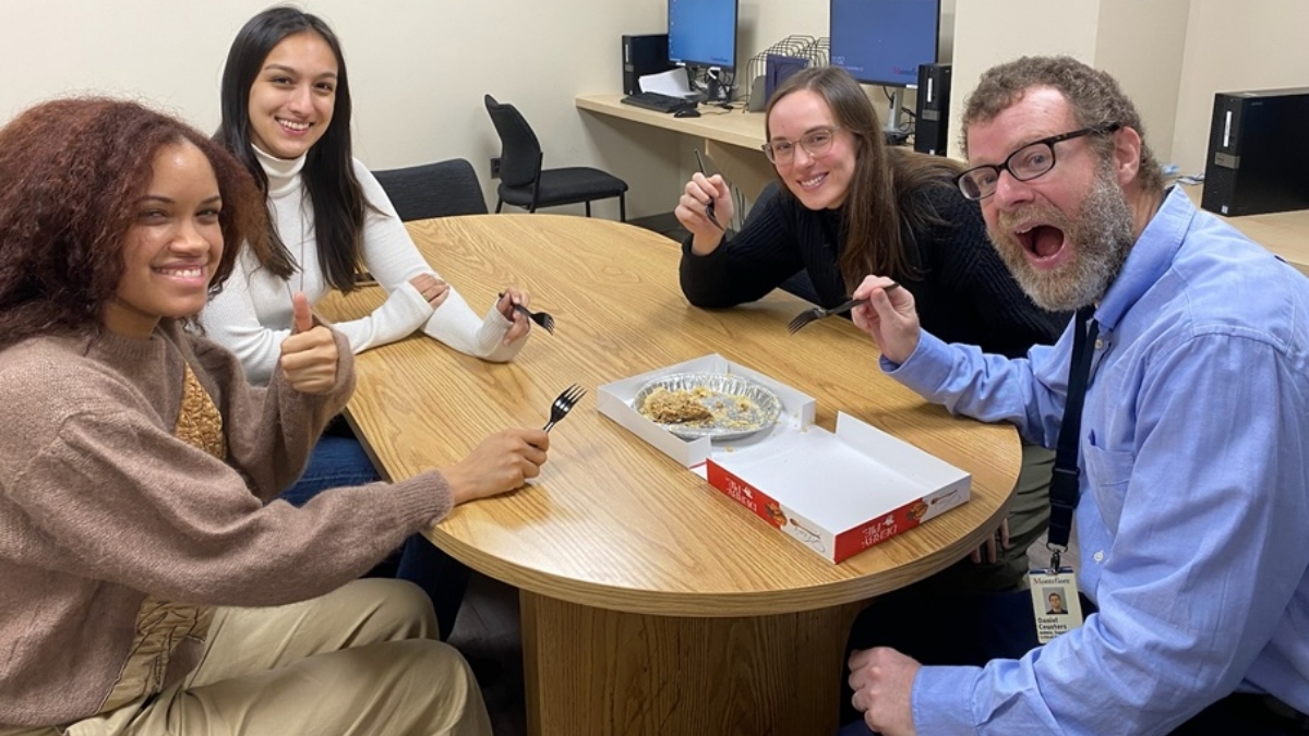 Research assistants Ofelia Garcia, Martha Torres, and Elizabeth Nelson, and administrator Daniel Ceusters, celebrate enrolling the final patient in the PREOXI trial. 